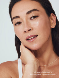Go-To Skincare Ring Light in Moonlight cream highlighter applied to cheeks and eyes for a radiant, glowy finish.