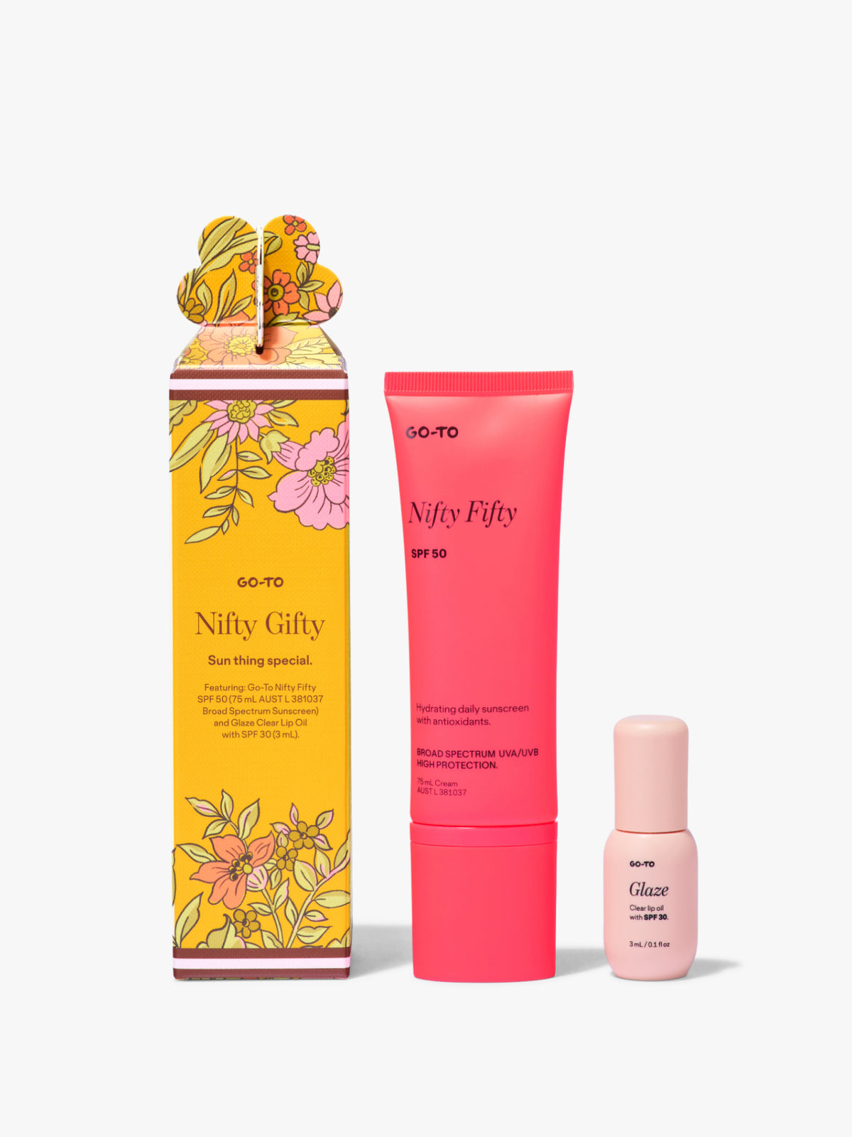 Go-To Skincare Nifty Gifty SPF 50 skincare gift set with a colorful floral box, pink sunscreen tube, and small pale pink skincare bottle on a white background
