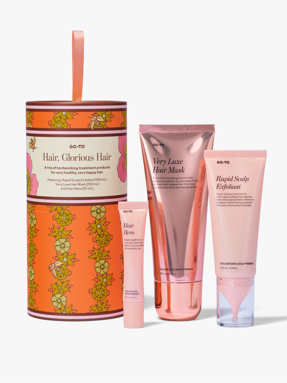 Go-To Skincare Hair Glorious Hair gift set with a floral tin and three pink hair care products including Very Luxe Hair Mask and Rapid Scalp Exfoliant.