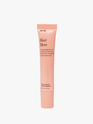 Go To Skincare Hair Hero 20 ml peach hair oil tube with flip top cap and label stating lightweight care for nourished soft and shiny hair