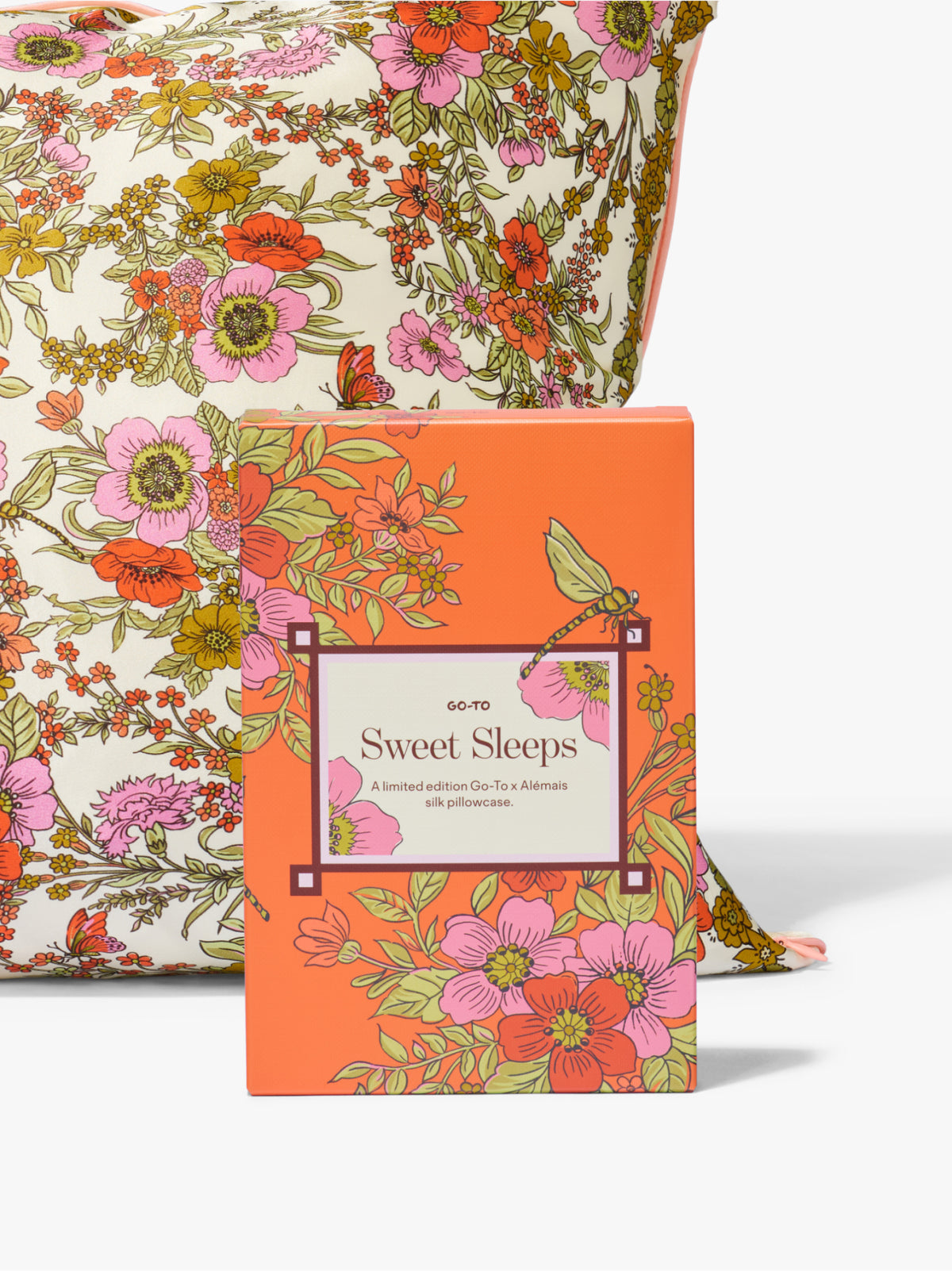 Sweet Sleeps floral silk pillowcase in a bright orange Go To Skincare box with a matching floral pillowcase displayed behind it